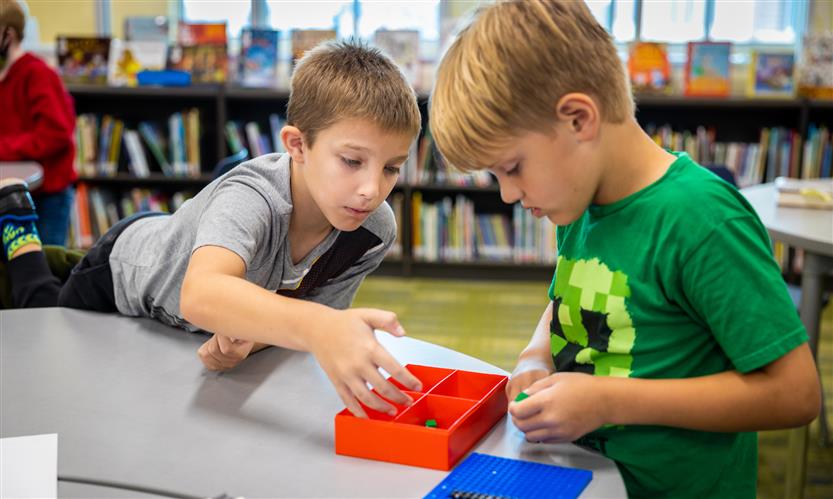 Students use robots in library